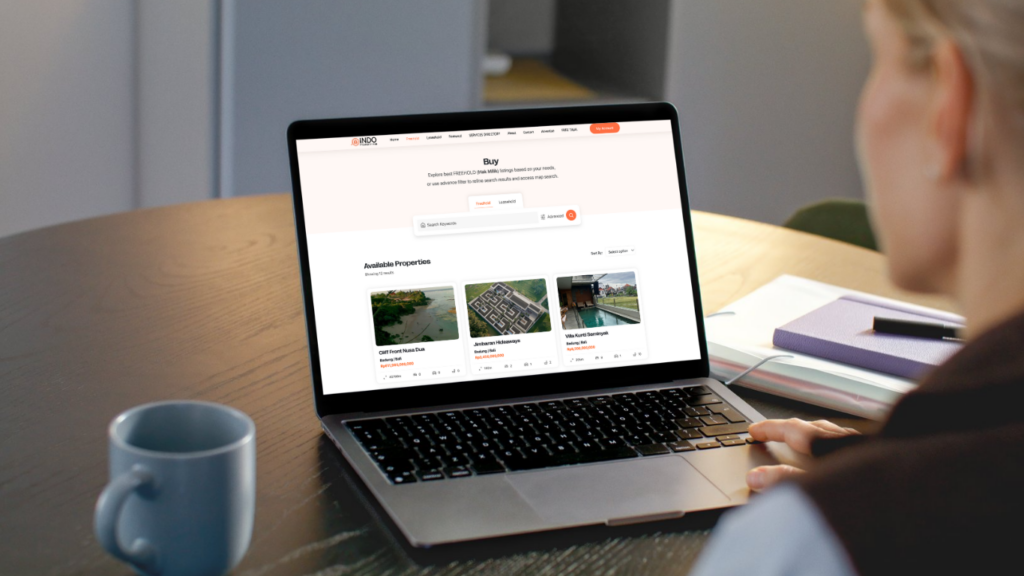 Women scrolling through Indo Property Hub, a platform to Buy house Bali