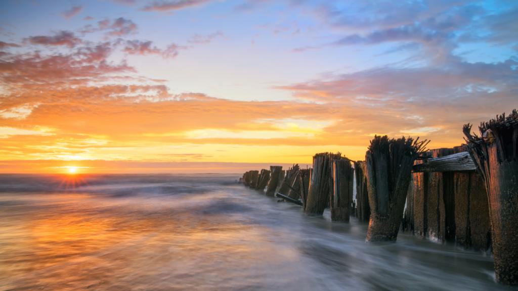 Sanur beach at sunrise with calm water, best places to stay in Sanur Bali for families and quiet routines